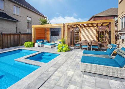 natural stone by swimming pool and wooden structures